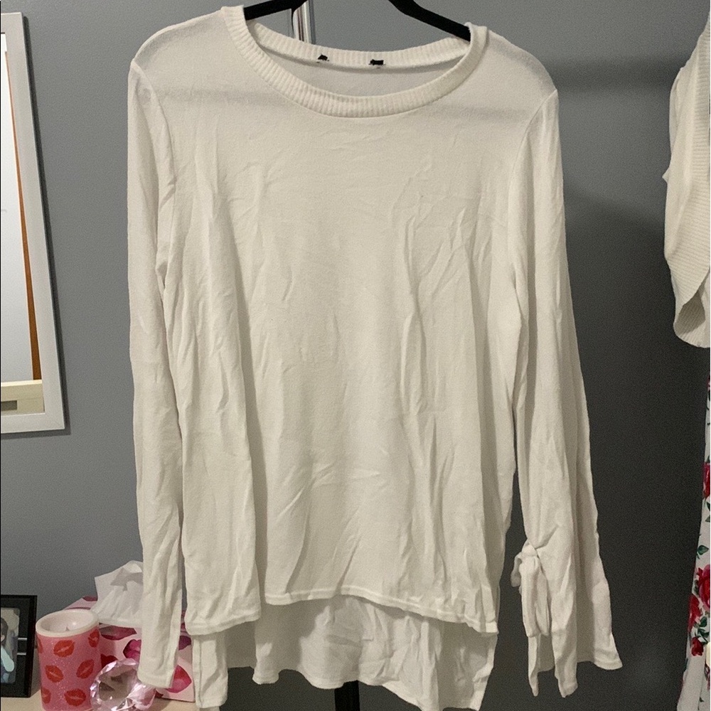 SOLD. Lightweight knit top, with tie up bell sleeves.